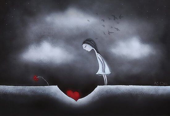 Kvinde der kigger ned i et hul med et hjerte