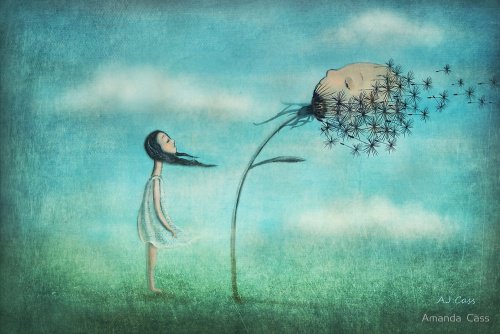 Pige der puster til et hoved lavet af maelkeboetter