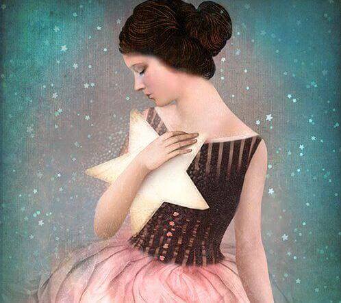 Pige der holder en stjerne