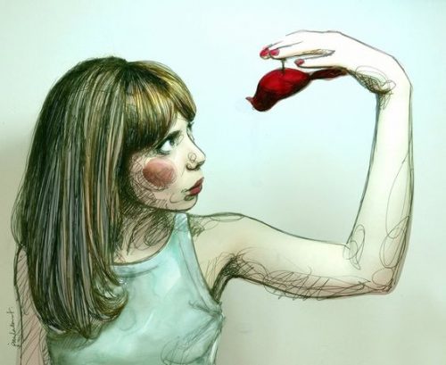 Kvinde der holder en fugl