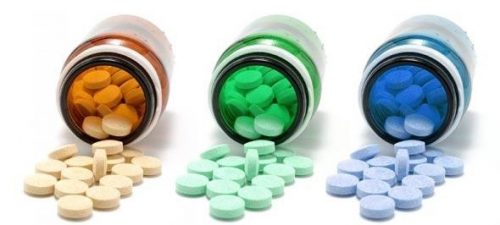 3 forskellige farver piller - Aarsager til haartab