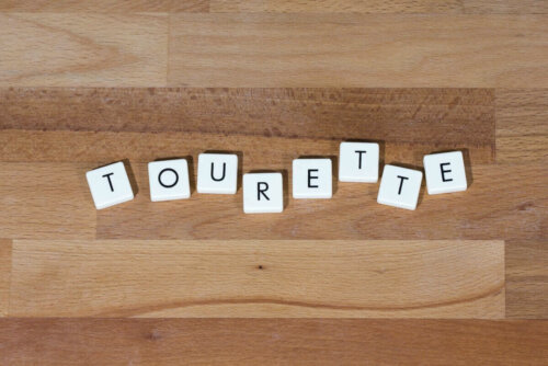 Bogstaver danner ordet Tourette